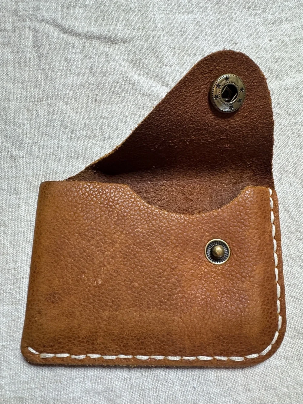 Leather card holder with metal snap. 4x3